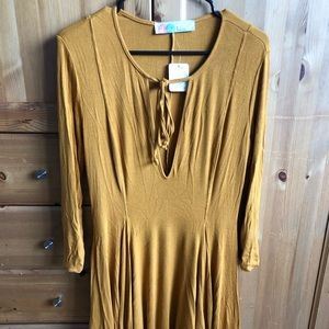 NWT Free People gold dress, Long sleeve. Size M